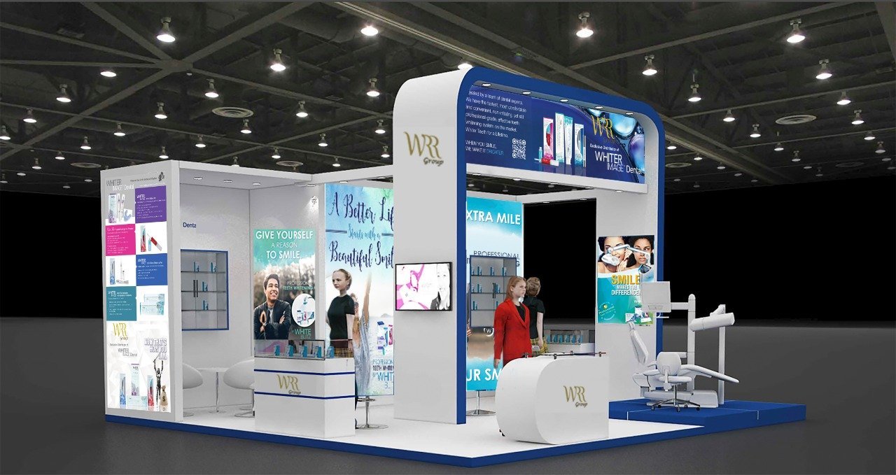 A modern exhibition booth showcasing dental care products with bright visuals and digital screens, featuring a clean and sleek design with multiple displays and a seating area for visitors.